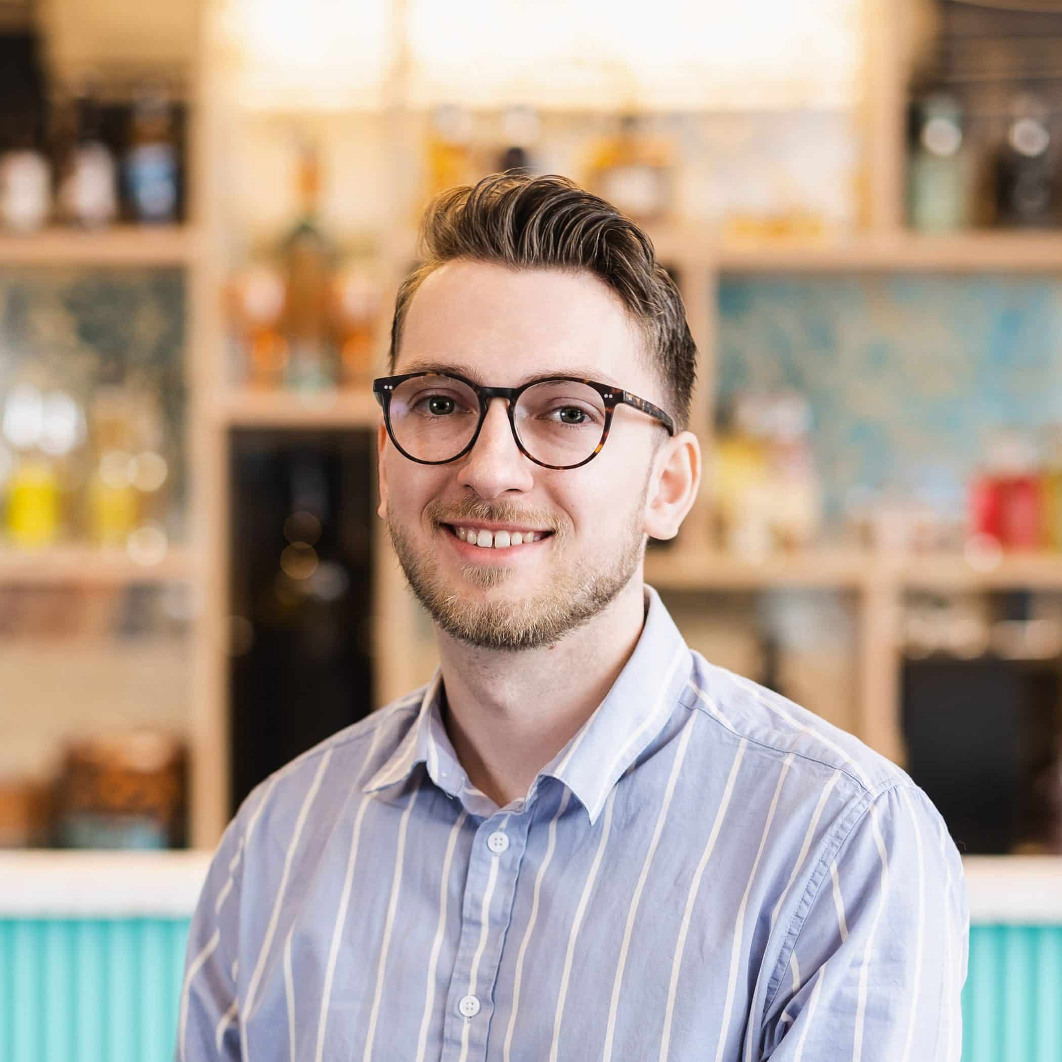 Josh Webster in front of the Croxsons bar