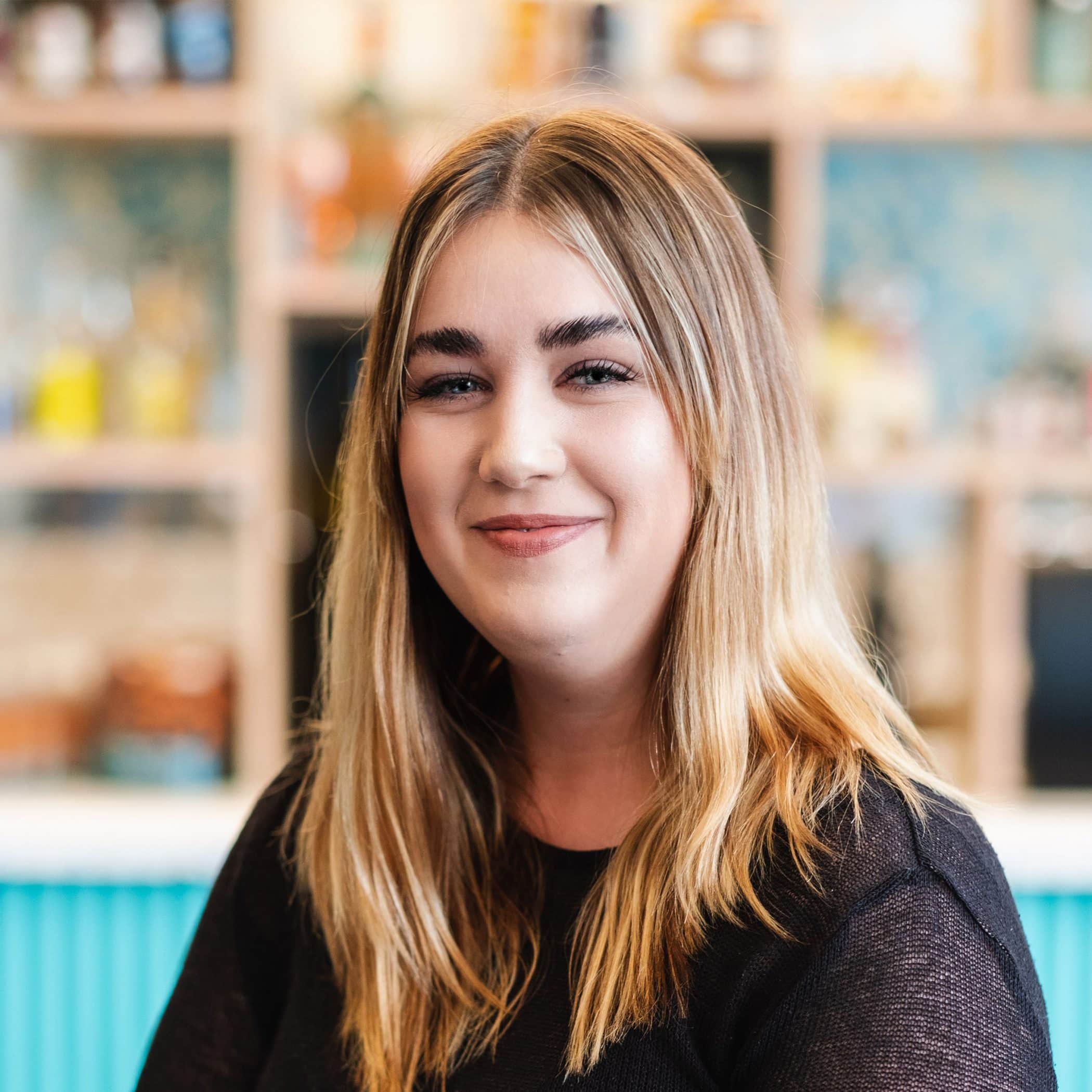 Lara Jones in front of the Croxsons bar