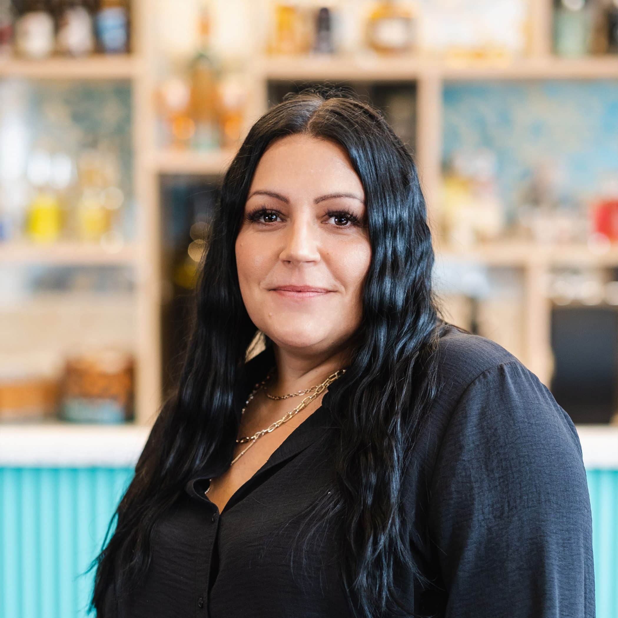 Vicky Carrington in front of the Croxsons bar